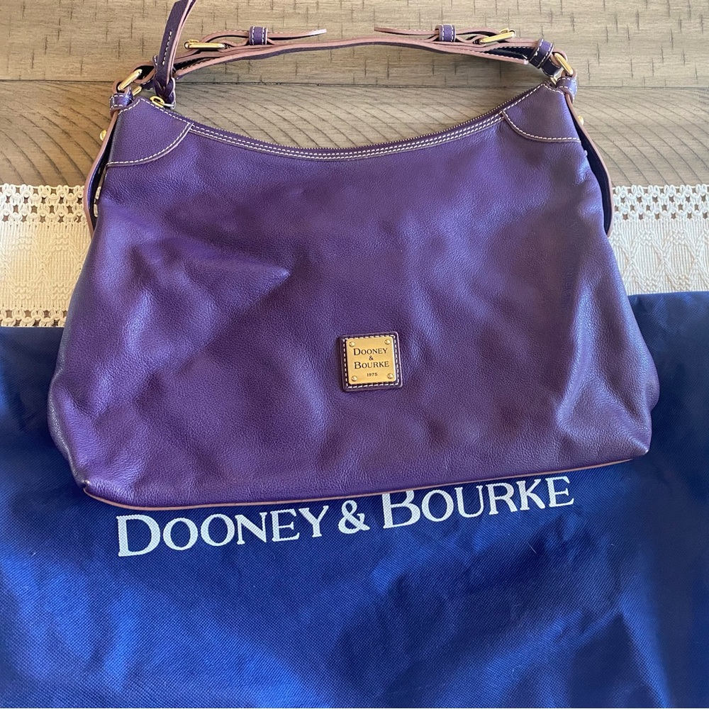 Dooney & Bourke hobo pebbled leather bag in purple